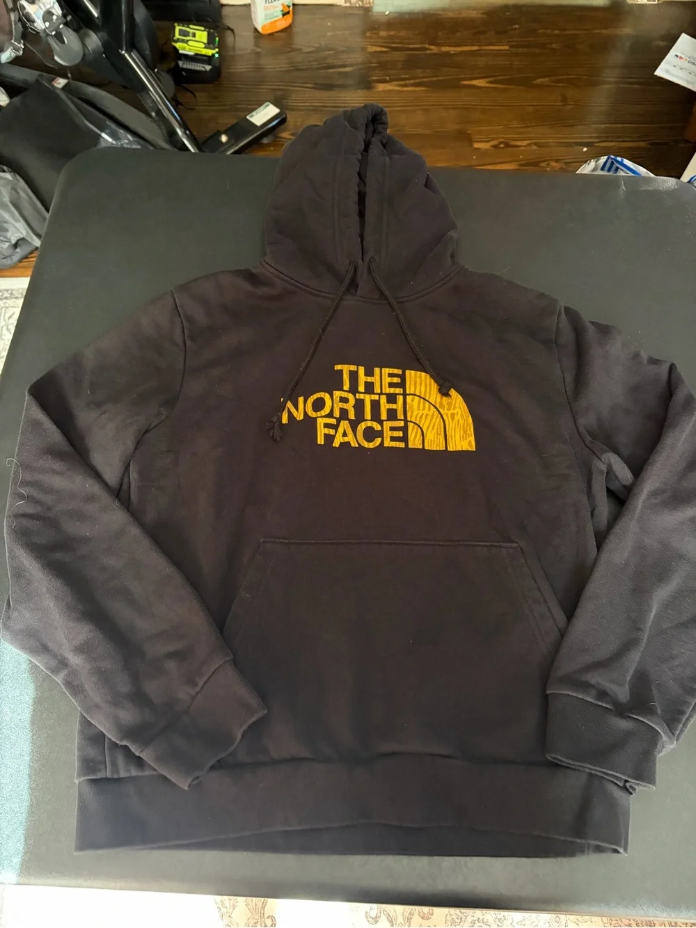 The North Face Black Hoodie with Yellow Logo
